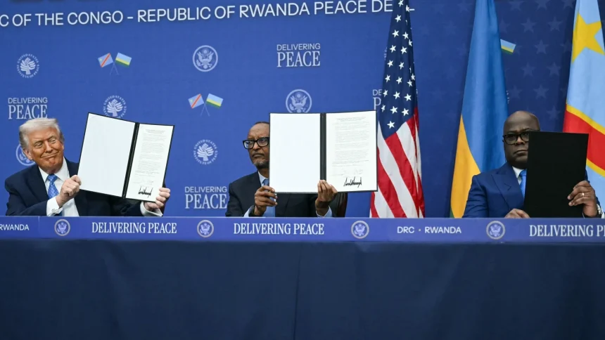 “DRC President Felix Tshisekedi and Rwanda President Paul Kagame signing the Washington Accords for Peace and Prosperity in Washington.”