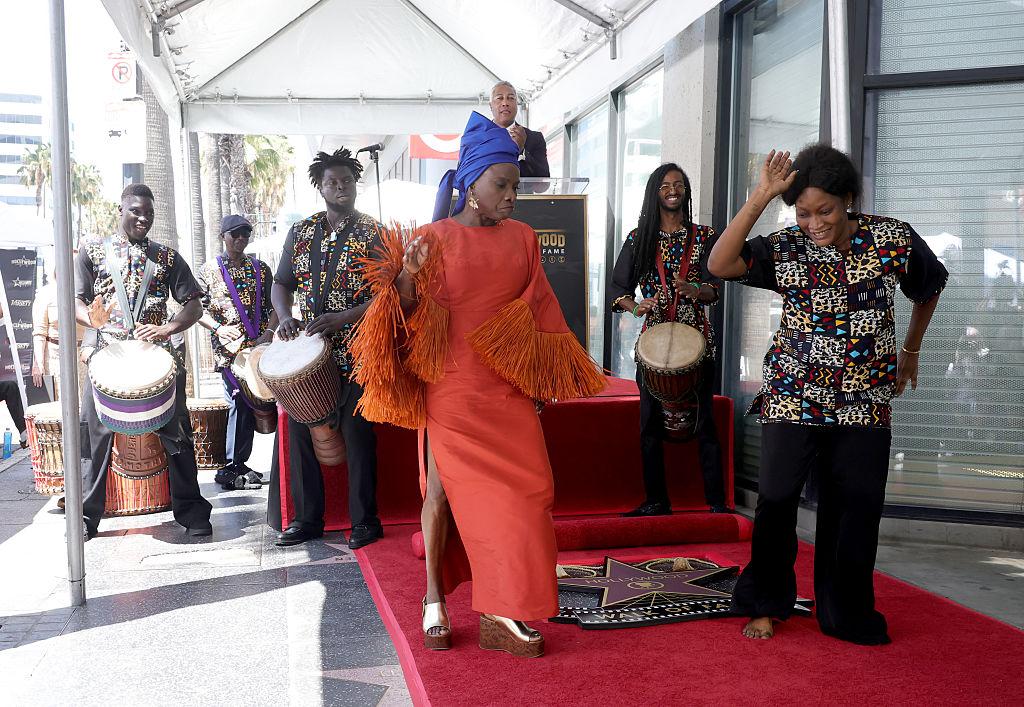 Angélique Kidjo dances with musicians during her Hollywood Walk of Fame ceremony in Los Angeles.