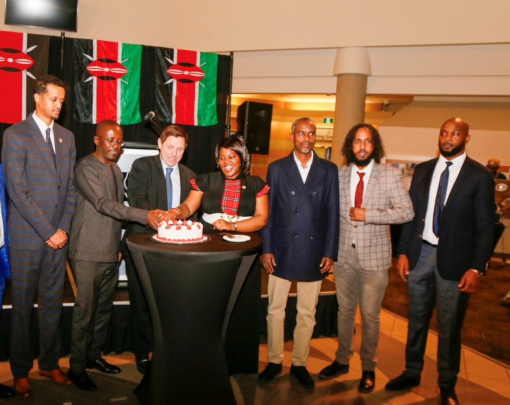Brampton Mayor Patrick Brown and Kenyan community representatives cutting a celebration cake at the Kenyan KONNECT 2025 and Kenya flag-raising ceremony in Brampton, Canada.